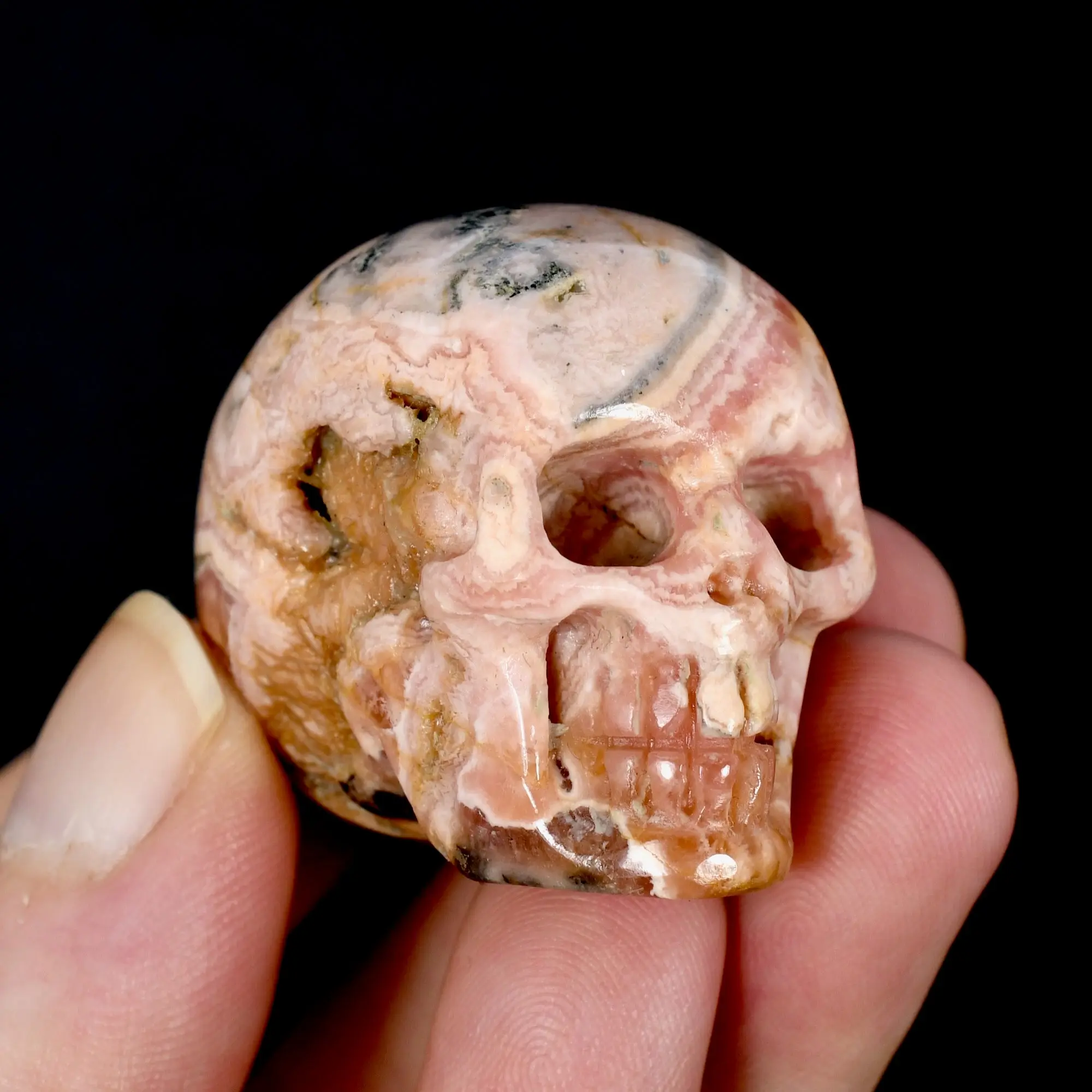 1.5in 65g Genuine Rhodochrosite Carved Crystal Skull, Argentina