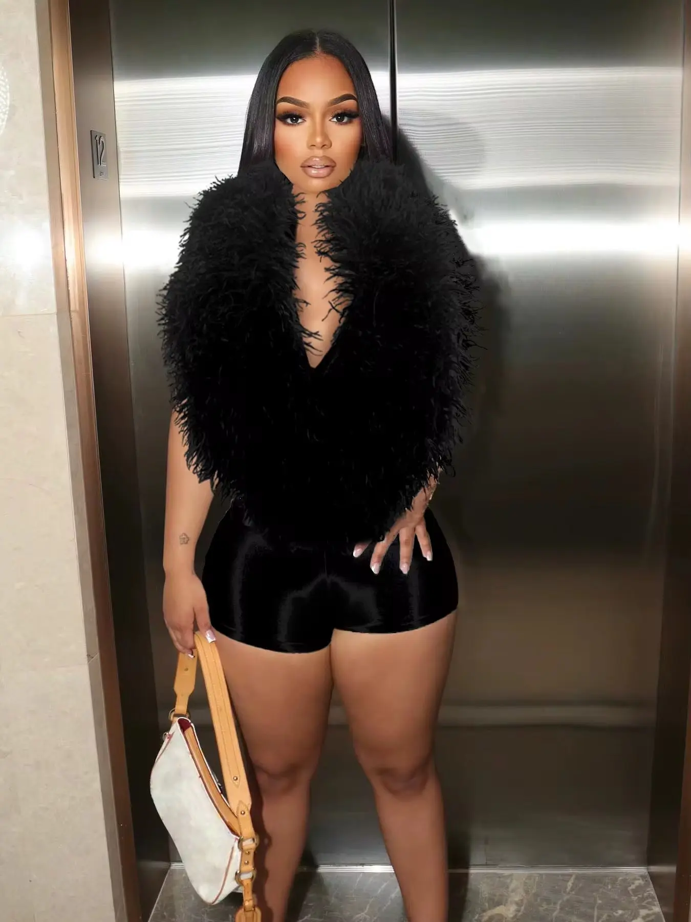 Soft Serve Feather Jumpsuit - Black Fur Design, Exclusive Fashion Icon Style, Above the Knee Length, Long Sleeve, Women's Wear, Minimalist Design, Summer Wear, Event Occasion, Basic Piece, Statement Overalls, Spandex, 93% Polyester 7% Spandex