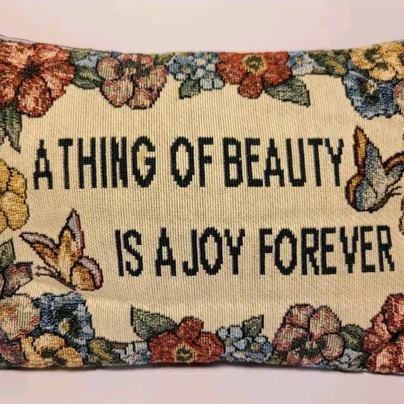 Tapestry Throw Pillow with "A Thing of Beauty is a Joy Forever" Design