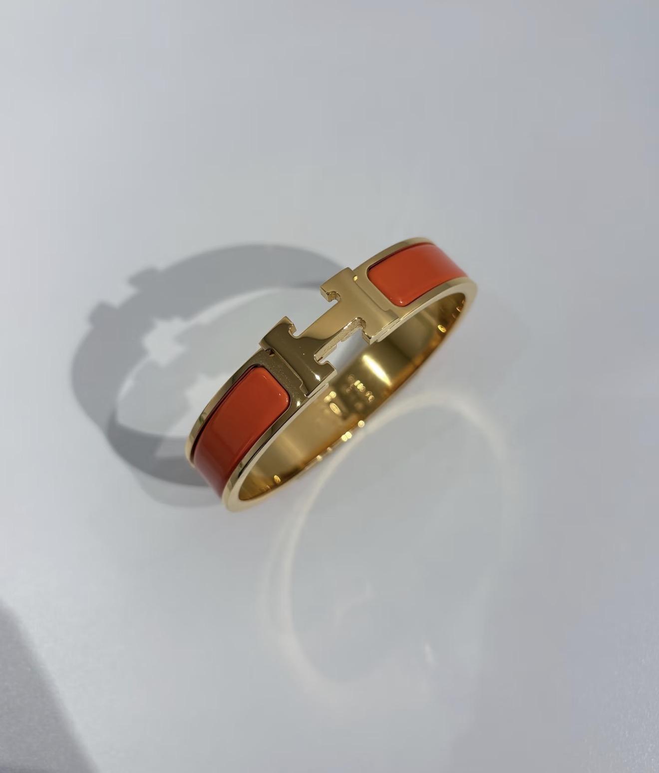 Pre-owned Hermes Clic H Bracelet Orange/Gold