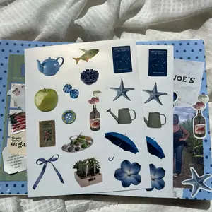 Gentle Earth Sticker Sheet with Assorted Designs Including Teapot Apples Flowers and Umbrellas