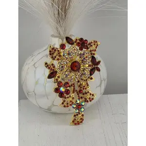 Ruby Flower Brooch: Gold Plated with Red Gemstone Accent