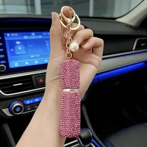 Diamond-studded perfume bottle keychain, creative mini spray bottle keyring, bag decoration pendant