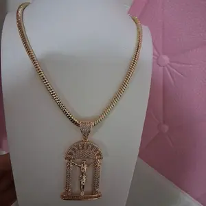 Snake chain with Christ pendant ,16 inches ,14 k gold laminated.