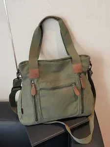 Fashionable retro casual minimalist atmosphere tote bag, decorated with contrasting color details, large capacity handbag, with multi pocket design, reasonable separation, multifunctional single shoulder crossbody bag