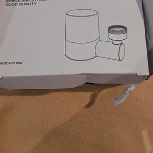 Faucet-Mounted Filter Extender with Rotating Water Outlet & Anti-Splash Design - PP Cotton Filter Captures 99% Impurities, Universal Fit for Most Pull-Out Faucets in Kitchens, Bathrooms Easy-to-Install Water Filtration Solution That Reduces Splatters