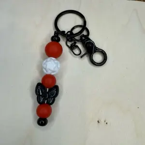 Red Black White Beaded Keychain with Butterfly Charm and Swivel Clasp for Easy Attachment