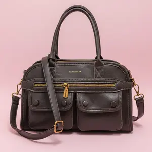 [Memorial Day Picks] A versatile leather-like satchel with multiple pockets, top handles, an adjustable strap, and a light beige interior with internal zip compartments, making it a stylish and practical choice for daily use.