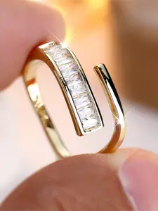 An open ring made of synthetic white zirconia in a fashionable and retro gold color is suitable for women to wear at travel parties Elegant Engagement Ring Jewelry Ring