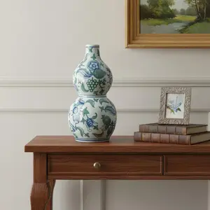 HomeRoots 574214 13 in. White Blue & Green Chinoiserie Porcelain Wavy Gourd Table Vase