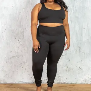 Solid Black Curvy 2-Piece Workout Outfit - Stylish Sports Bra and Leggings Set for Plus-Size Fitness Enthusiasts - Textured Microfiber Fabric - Stylish Workout Clothing - High-Waist Leggings - High-Performance Athletic Wear