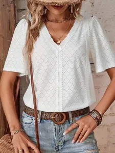 A women's white V-neck puff-sleeve embroidered short-sleeve Fitted top, made of lightweight and breathable fabric with a naturally fresh and sweet touch, suitable for casual summer occasions such as shopping, light dates at cafs, or weekend markets.
