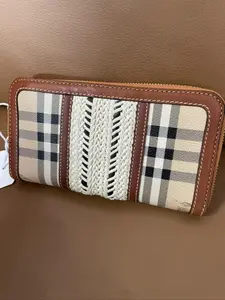 Pre-owned BURBERRY Leather clutches & wristlets Beige Wallet