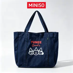 MINISO TUNEE Goods oversized denim tote bag, heavy-duty canvas shoulder bag—spacious, reusable grocery and travel bag with a cute cartoon print