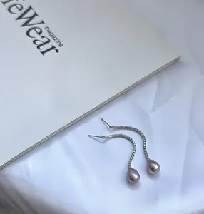 E21-The ‘Lumina Sweep’ Pearl Drop Threaders — A Scintillating Arc with a Lavender Pearl Drop. pearl drop earrings, long pearl earrings, pearl threader earrings, purple pearl earrings, lavender pearl earrings, freshwater pearls