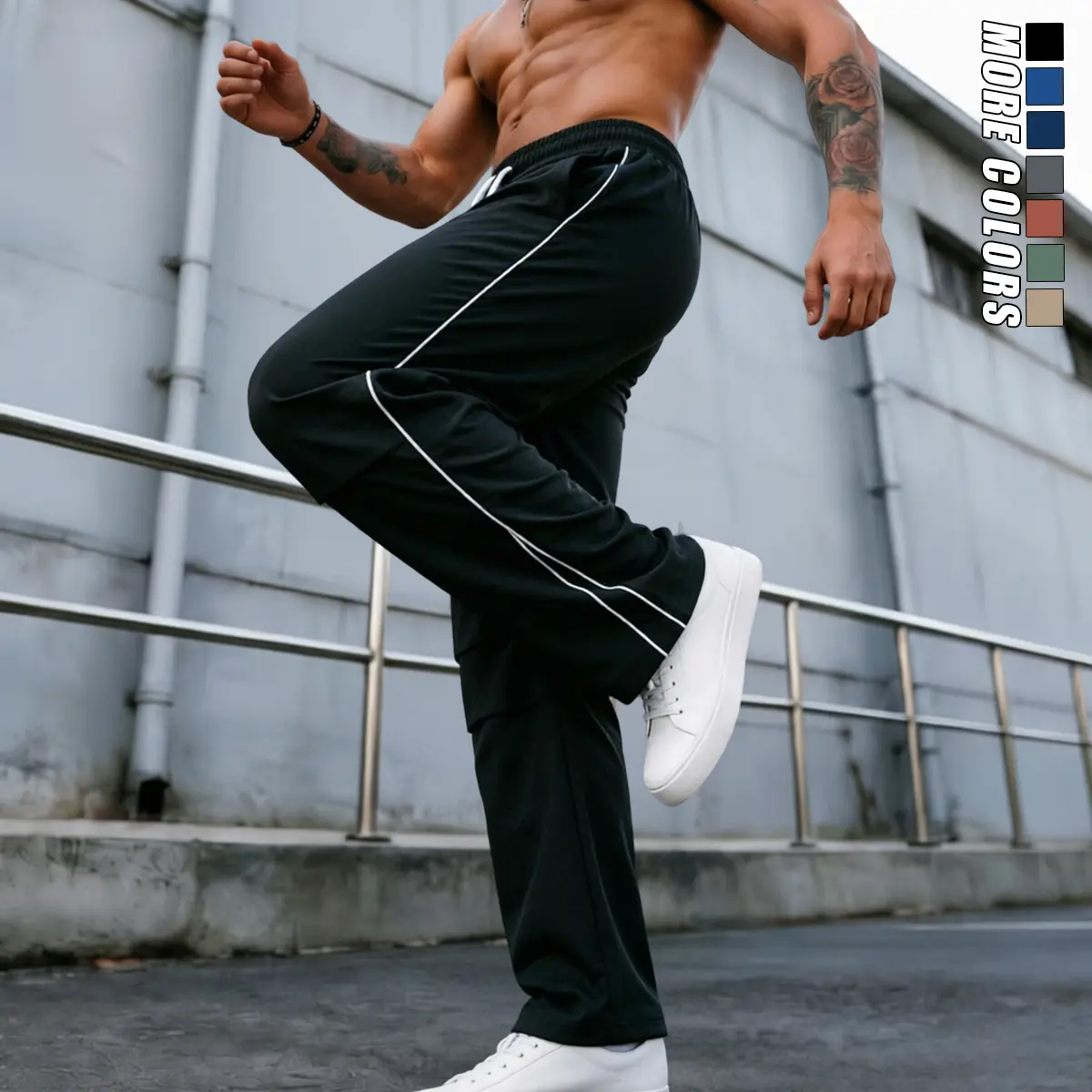 Versatile polyester men’s double-striped wide-leg sports pants—quick-drying polyester fabric with good breathability, adjustable drawstring waist, minimalist solid color design that pairs easily with various casual athletic tops.