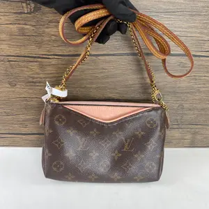 Pre-owned Louis vuttion Louis Vuitton Monogram Canvas Pallas Crossbody Bag with Pink Interior with bag charm