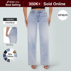 Women’s medium-low rise loose denim jeans with an elastic waistband and wide legs; distressed/worn look; basic minimalist design; comfortable fit; tummy control; figure-flattering (curve-embracing); available in plus sizes and regular sizes; BBLGARMENTARY