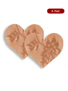 A pair of  brown heart pattern lace nipple covers,  with a seamless patch design, providing comfortable and reusable protection for nipples, gentle on the skin.  specially designed for matching strapless dresses and halter neck skirts to prevent bumps.