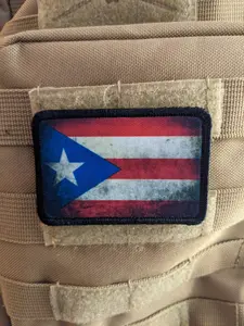 distressed flag of Puerto Rico worn 2"x3" morale patch with hook and loop backing