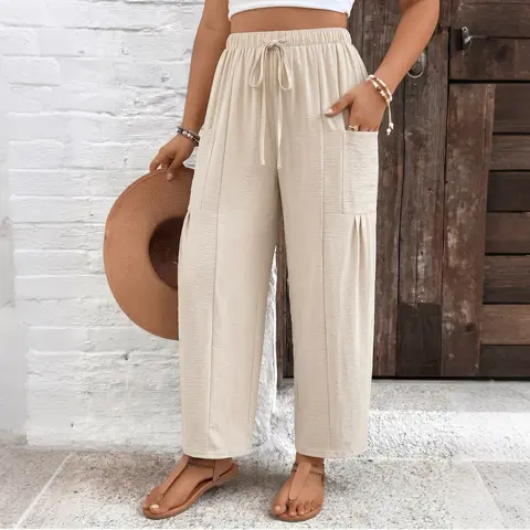 Women’s casual wide-leg nine-tenths pants with an elastic drawstring waist, wrinkle-resistant textured fabric, and pockets—versatile for business-casual wear, suitable for office, home office, brunch dates, and everyday outfits.