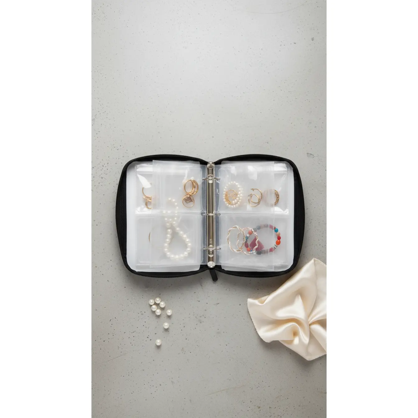 Transparent Travel Jewelry Organizer Book – 80-Pouch Binder Case for Earrings, Rings, Necklaces & Bracelets (Black)