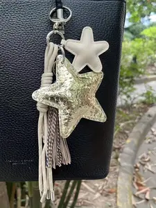 Gold Star Tassels Braided Rope Keychain Bag Pendant Charm PU Five-Pointed Star Keychain Bag Accessories for Handbag,Backpack,Purse Decoration Stars Tassel Keyring Decorative Tassel Star Shaped Pendant Bag Charms Bag Hanging Jewellery Couple Ornament Gift