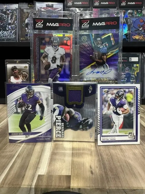 This is a lot of 5 cards including LAMAR JACKSON, KEENAN McCARDELL AUTO , BERNARD PIERCE player worn jersey