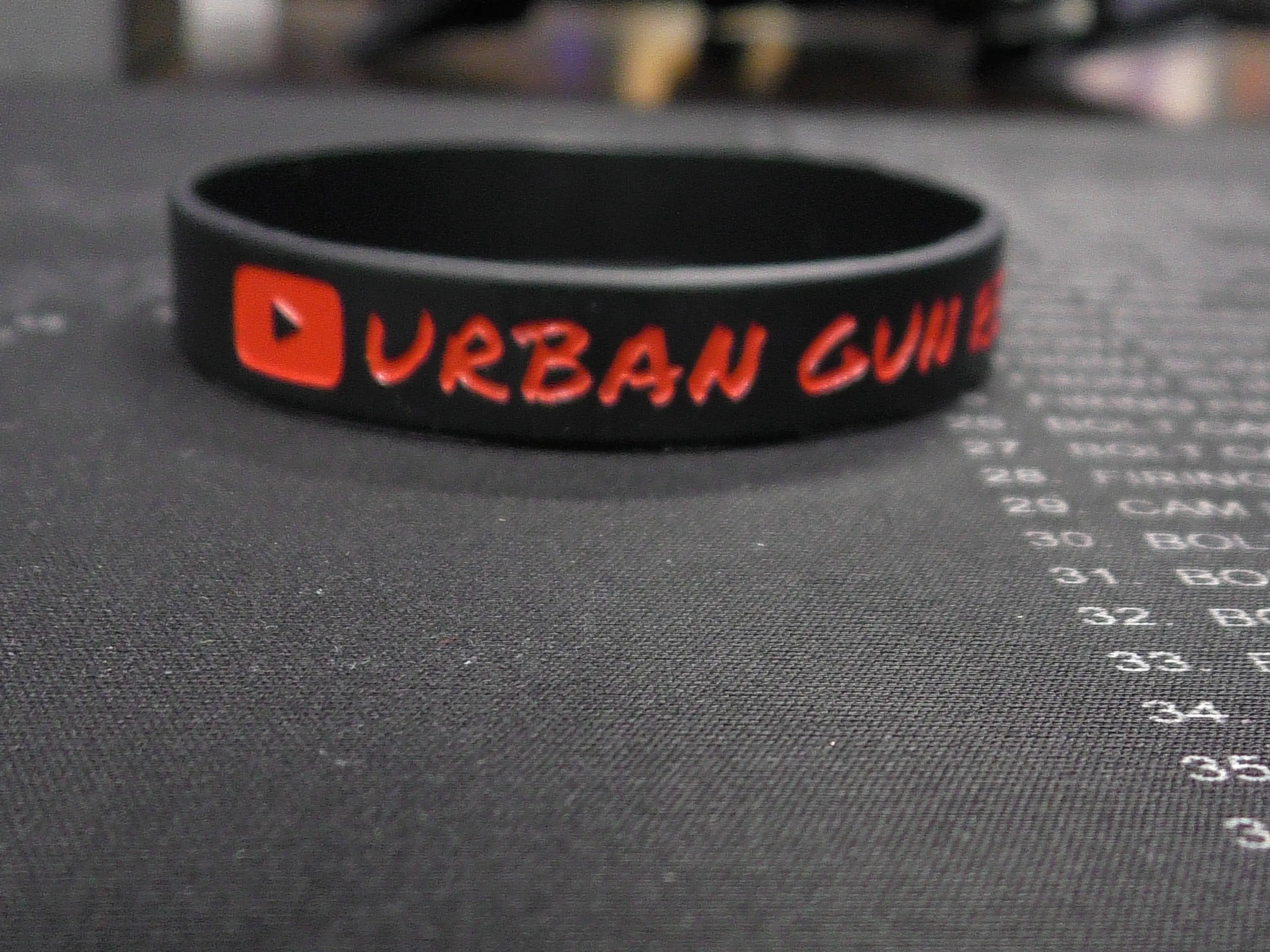 Urban Gun Reviews wristband. Urban Gun Reviews wristband.