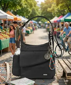 Travel the world with peace of mind, Travelon Anti-Theft Classic Messenger Bag: Slash-resistant, locking straps, & RFID-blocking