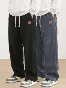 Men’s American vintage black corduroy pants with textured leather label and drawstring, loose wide-leg streetwear casual pants