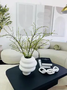 SEED BRANCH IN MODERN CERAMIC VASE