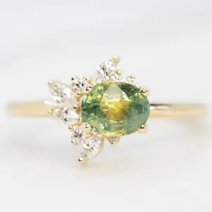 Amaya Ring with a 1.25 Carat Green Oval Sapphire and White Accent Diamonds in 14k Yellow Gold - Ready to Size and Ship