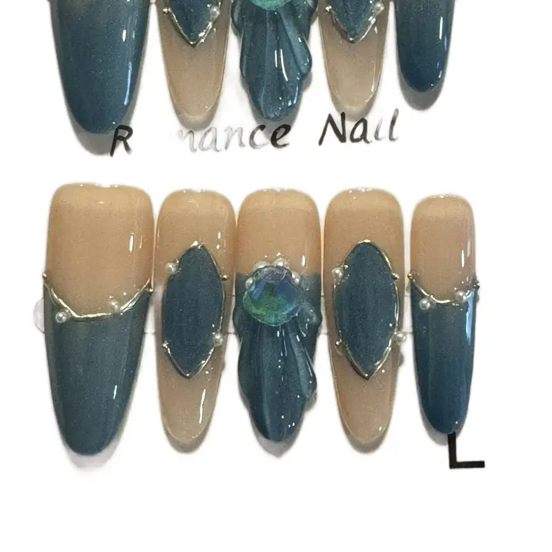 Handmade Long Stiletto Shaped Press On Nails with Bling and Style Featuring Elegant Teal and Beige Gradient Design
