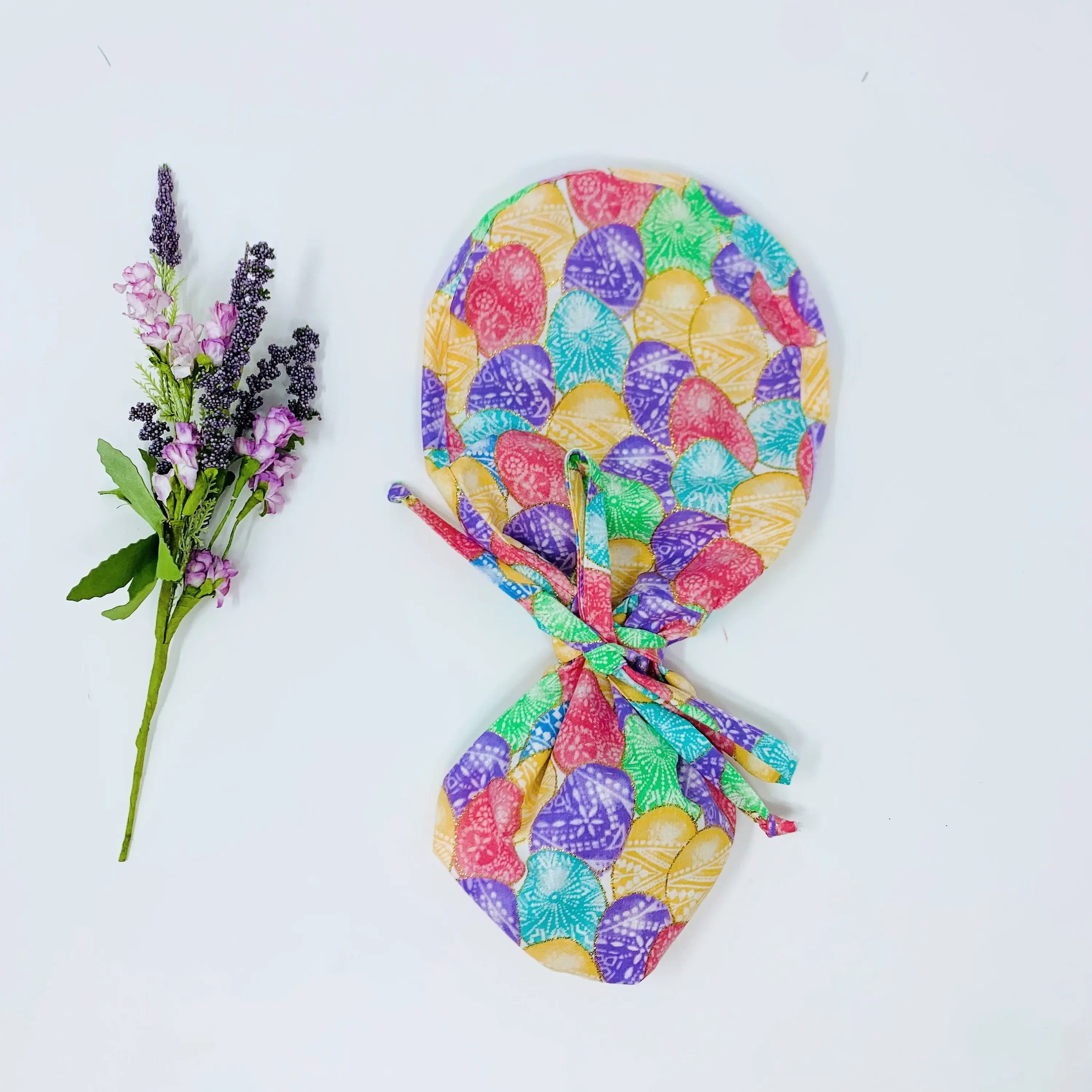 Easter Eggs Ponytail scrub cap for women with satin lined option by Paradise Caps.