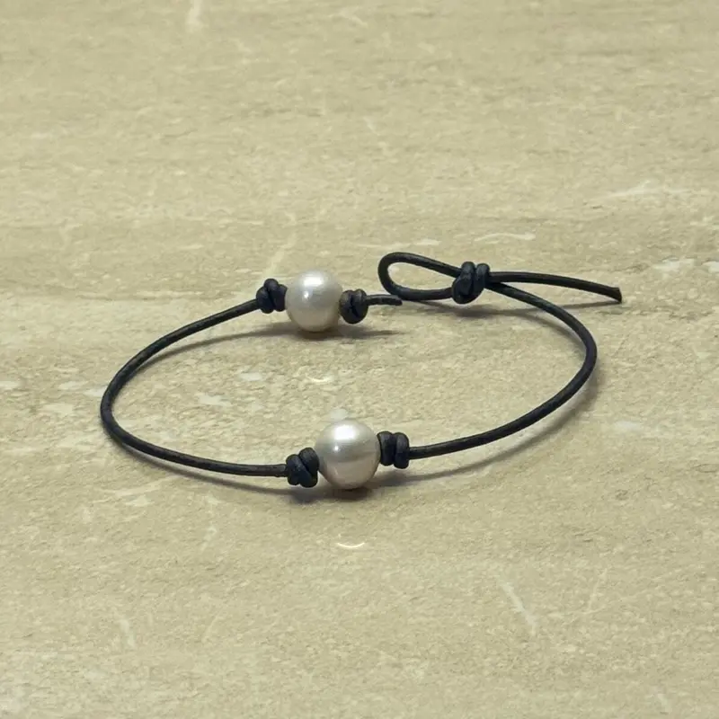 Single White Pearl Bracelet with Natural Blue Leather Cord
