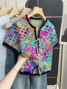 Women's khaki bohemian vacation short-sleeve knit top. Loose round neck, contrast geometric print, front tie and contrast piping. Comfortable for spring & summer casual wear.