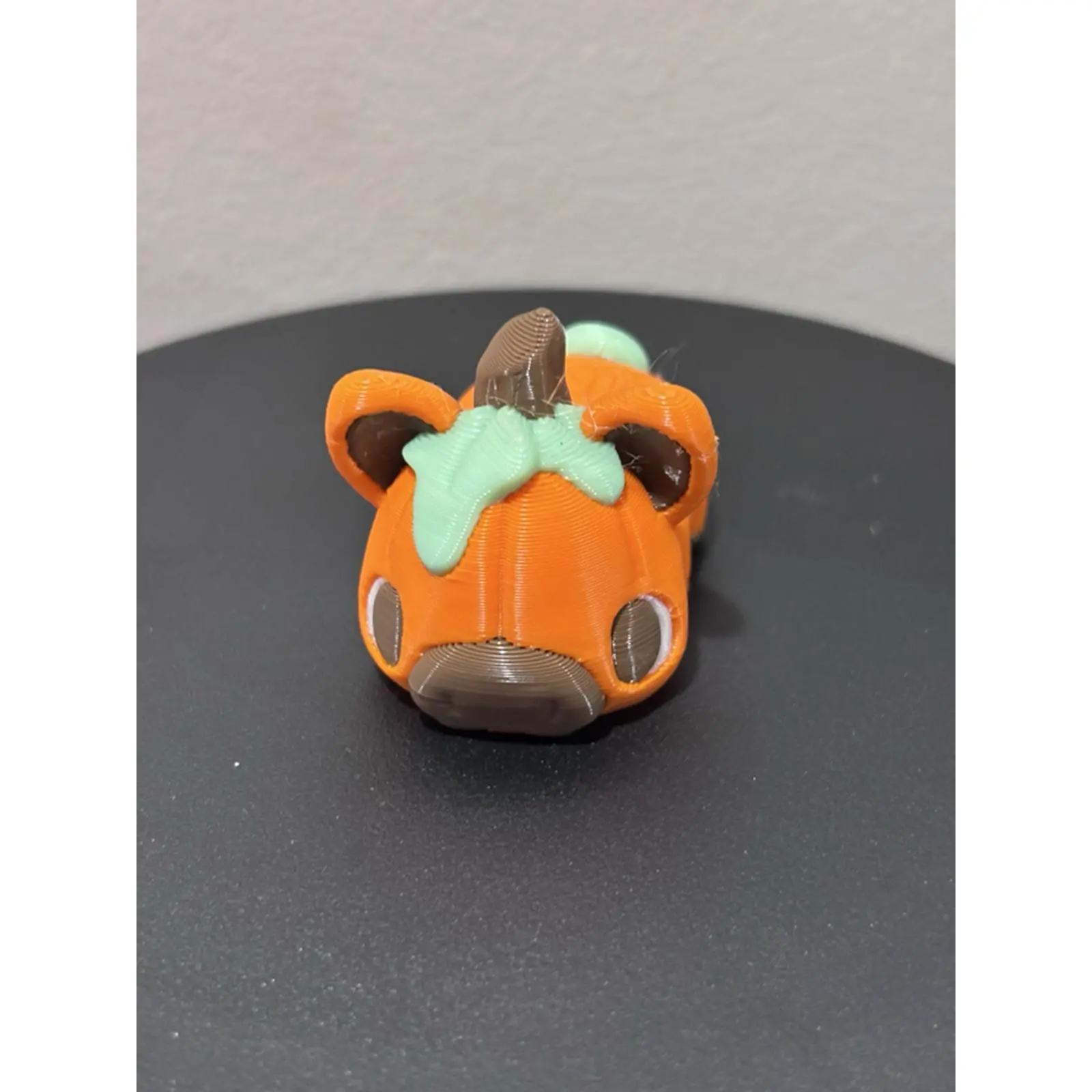 Pumpkin Pig - Adorable Orange and Green Figurine for Collectors and Decor