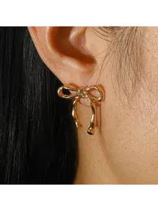 Hollowed-out bow earrings, women's stud earrings, simple and unique earrings, minimalist retro butterfly earrings.