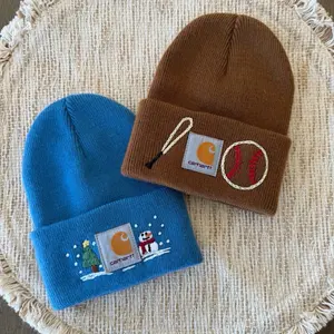 Carhartt Newborn Beanie with Snowman design and Carhartt Newborn Beanie with Baseball Design