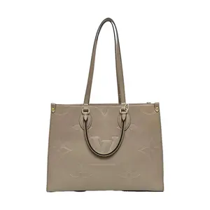 Pre-owned Louis Vuitton leather Tote Bags Onthego MM Tote Bag in Tourterelle Monogram Empreinte with Gold Hardware