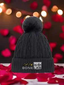 Logo for BONELAB by Monack 2026 new model Multi Color Soft Fabric Pom Pom Winter Hat Warm Cozy Unisex Headwear with Universal Fit Versatile Cold Weather Accessory for All Genders & Outfits