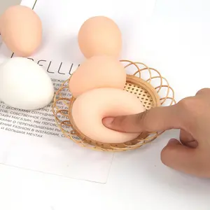 2-piece novelty egg-shaped squeeze toy set, realistic egg design, soft slow-rebound soothing ornament, unique single-piece gift Stress Relief Glutinous Rice Cake