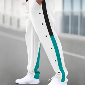 Men's spring and autumn casual pants with adjustable drawstring waist, featuring side pockets, perfect for everyday wear, color-block design, button details, a must-have for daily commuting, and street sports style