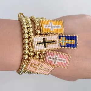 Gold beaded bracelet with Miyuki cross