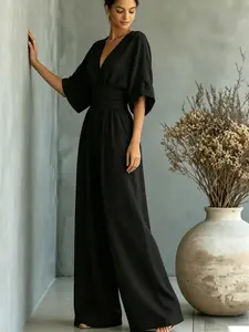 Summer new fashionable and high-end V-neck one-piece wide leg pants with cinched waist for slimming effect. Bubble sleeve design is suitable for daily travel, outdoor lawn banquets, light wedding outfits, afternoon tea, commuting