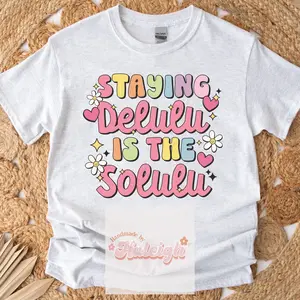 Staying delulu is the new solulu unisex cotton/ poly t shirt for woman Comfortable Cotton funny crime shows feminism feminine energy outdoors coffee Womenswear Unisex Top Polyester Oversized Soft T-Shirt emotion character coffee lover