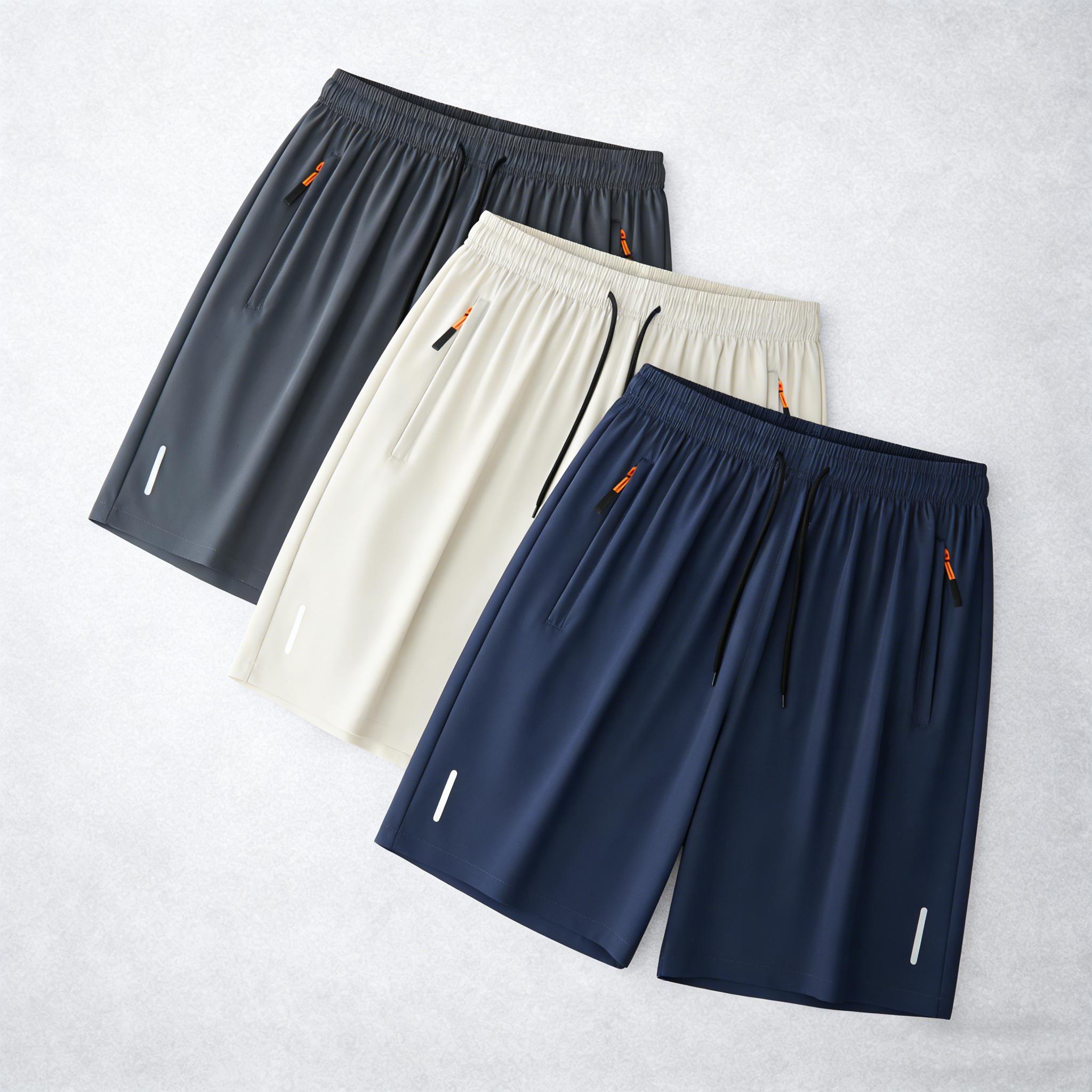 7-pack men’s ice silk quick-dry athletic shorts featuring zippered pockets and contrasting zipper head design; breathable, lightweight ice silk summer shorts for fitness, running, and casual wear—an essential for workouts and comfortable for home wear in