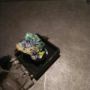 1 Azurite stone in small display case.