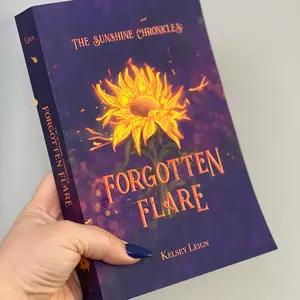 Paperback copy of Forgotten Flare - a romantasy novel